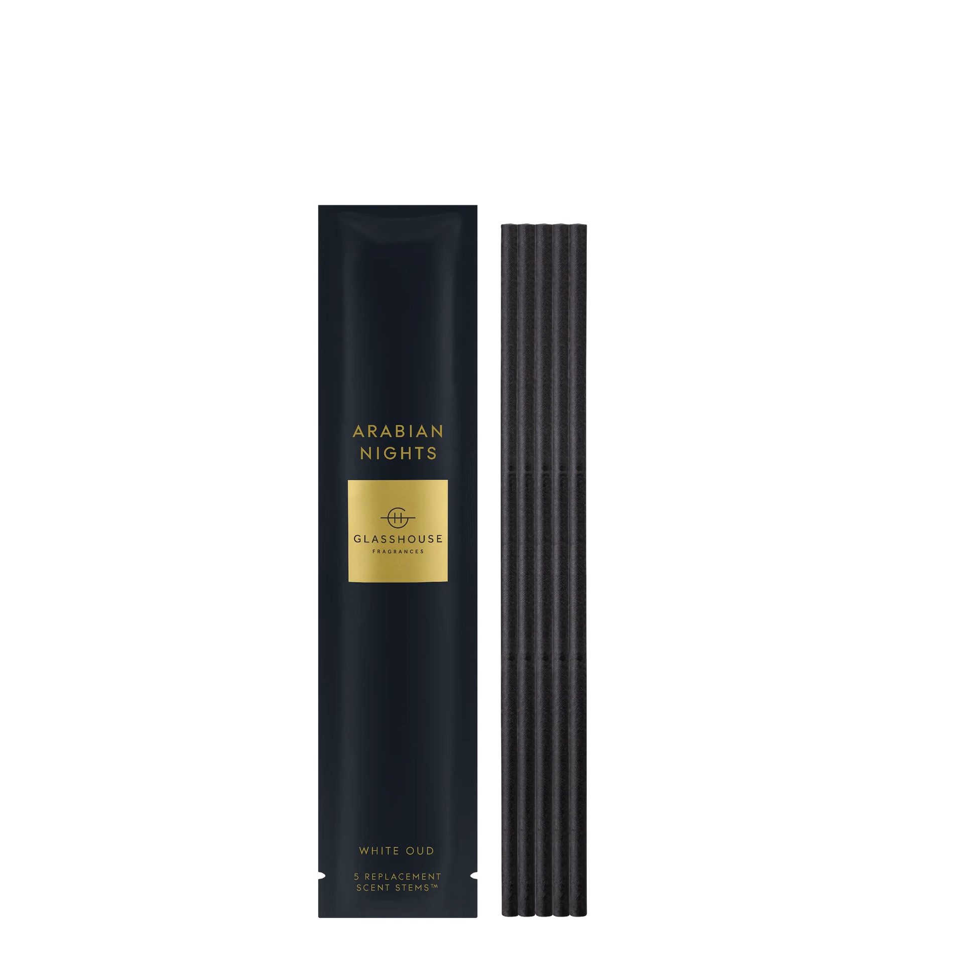 Arabian Nights scent stems set next to its black and gold packaging