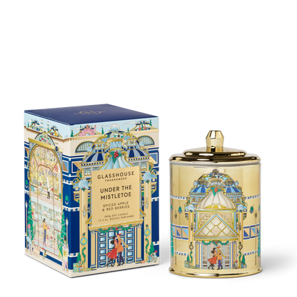 Under The Mistletoe Candle set next to its box packaging showing a side view of the box