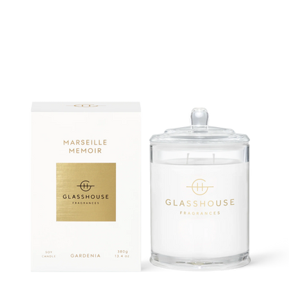 Marseille Memoir candle set next to its white box packaging.