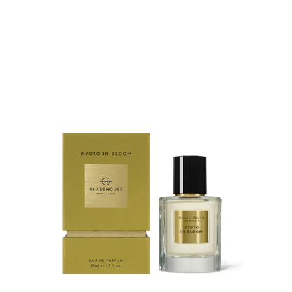 bottle of Kyoto in Bloom Eau De Parfum set next to its box packaging