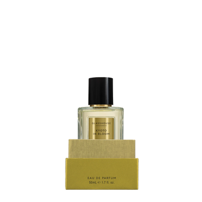 bottle of Kyoto in Bloom Eau De Parfum in its box packaging with the lid off