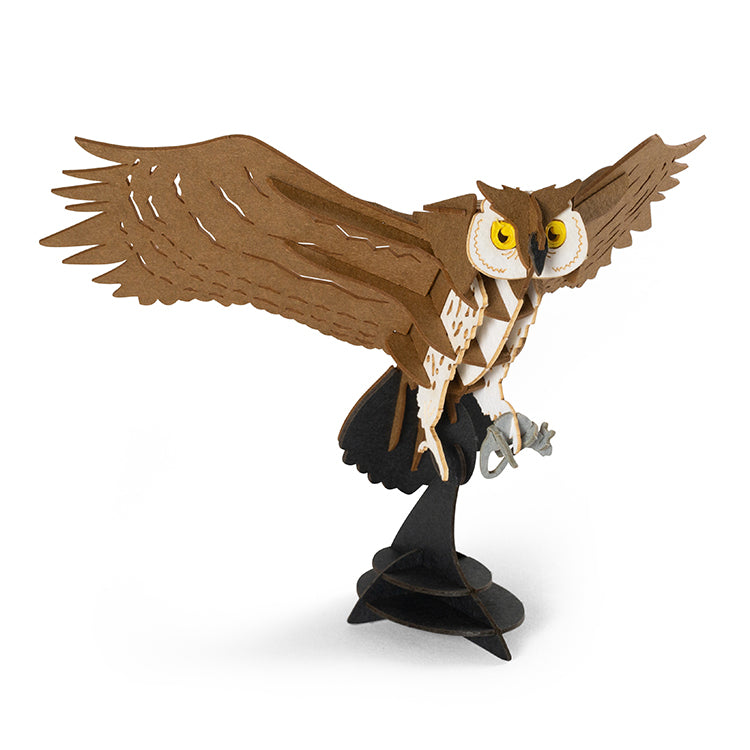 an assembled owl 3d puzzle on a white background