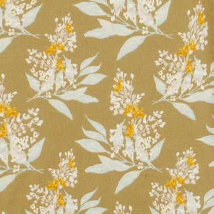 close-up of golden floral fabric.