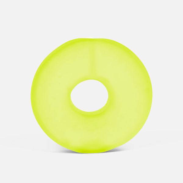 Yellow stress ball loop on a light gray background