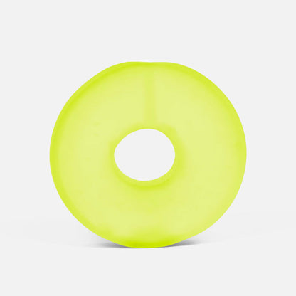 Yellow stress ball loop on a light gray background
