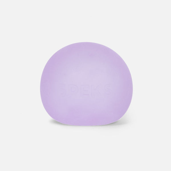 A purple stress ball with the brand name 'Speks' written on it.