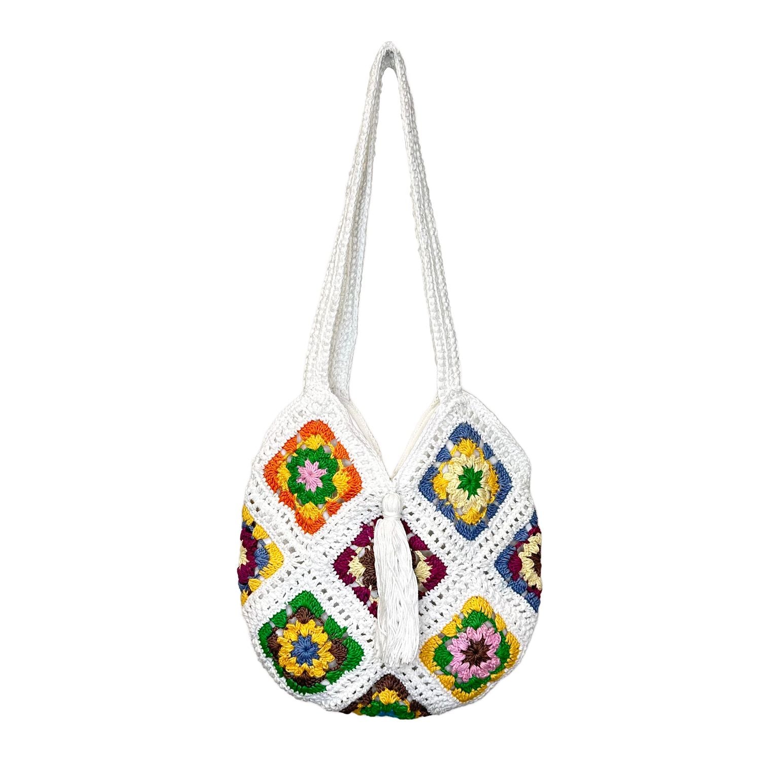 white purse made of colorful crochet granny squares.