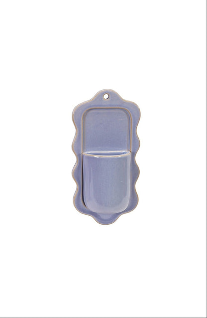 light blue stoneware wall pocket with scalloped edges