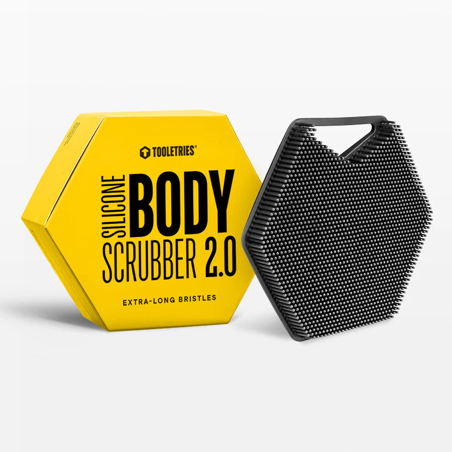 body scrubber set next to its yellow box packaging.