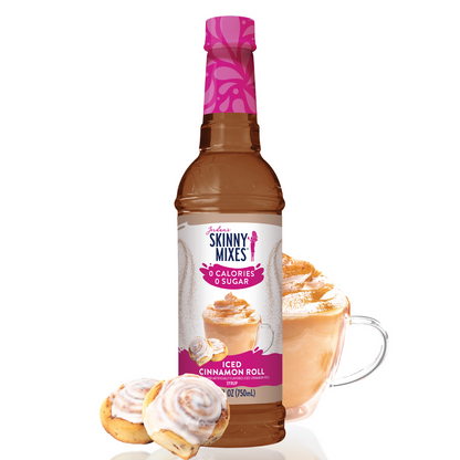 bottle of Iced Cinnamon Roll Syrup with a coffee beverage and cinnamon rolls arranged around it