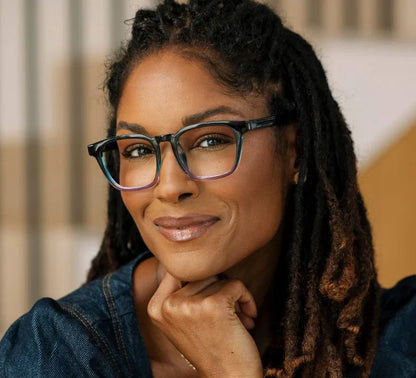 person wearing the  blue/purple latte glasses frame