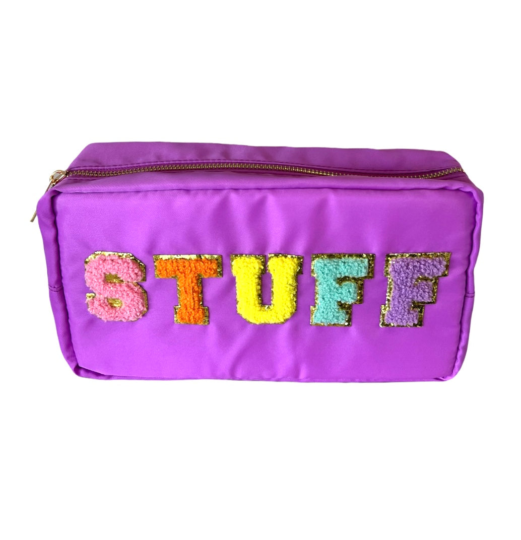 top view of "stuff" bag showing gold zipper.