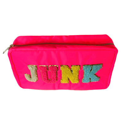 top view of hot pink junk bag showing gold zipper.