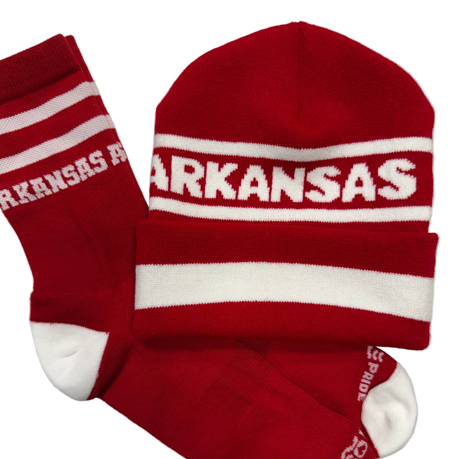 Red and white socks and beanie with 'ARKANSAS' text on them