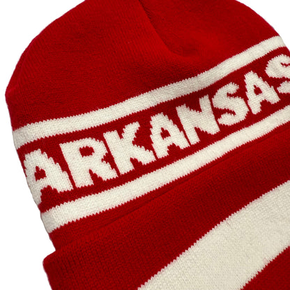 close-up of Red and white beanie with 'ARKANSAS' text on a white background