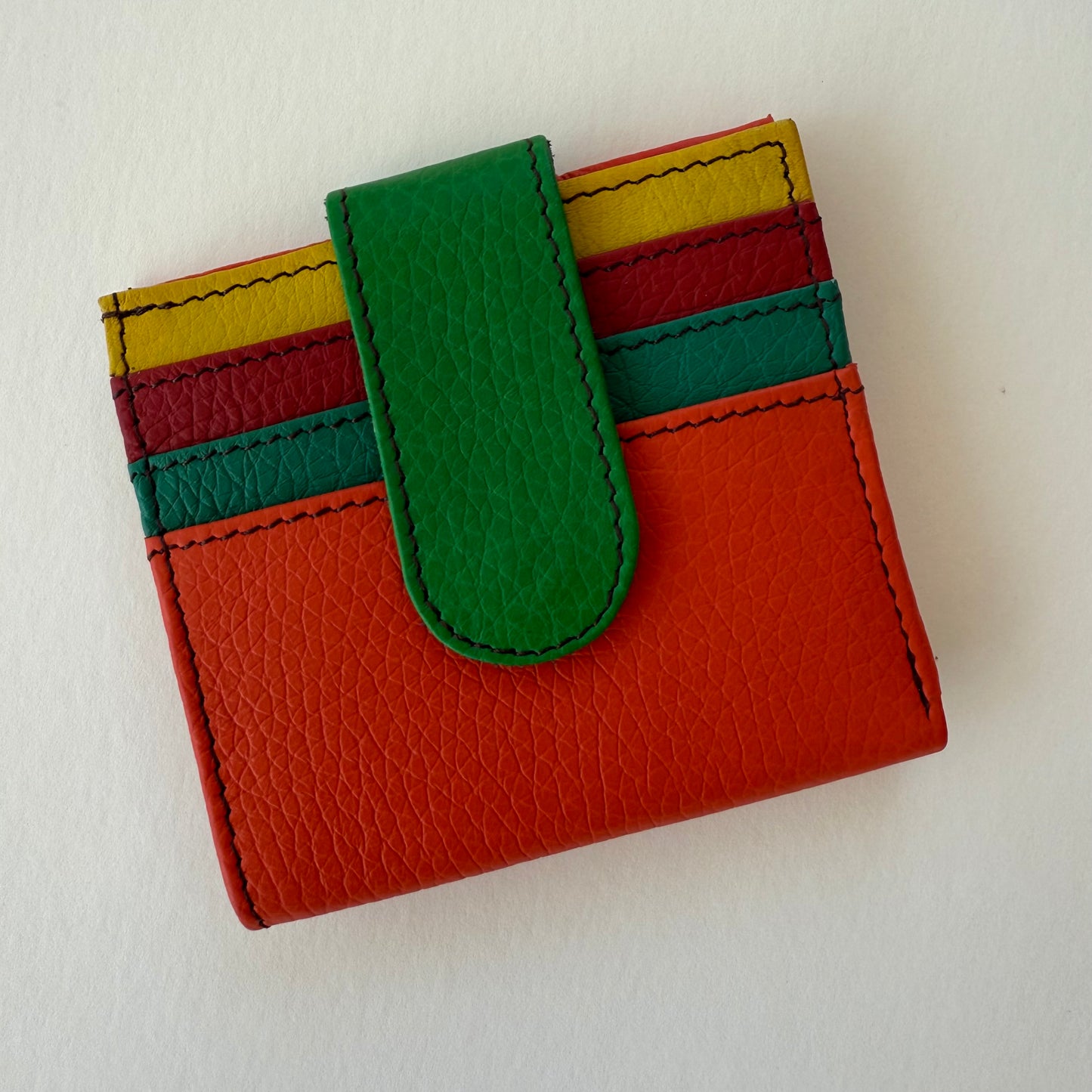 orange wallet with colorful card slots