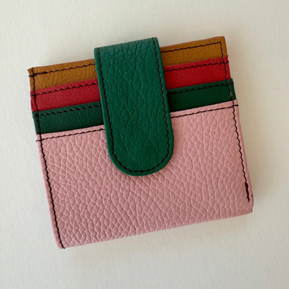 carnation pink colored wallet with colorful card slots