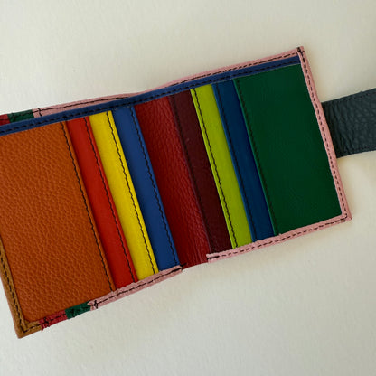 Colorful leather wallet with multiple card slots on a white background