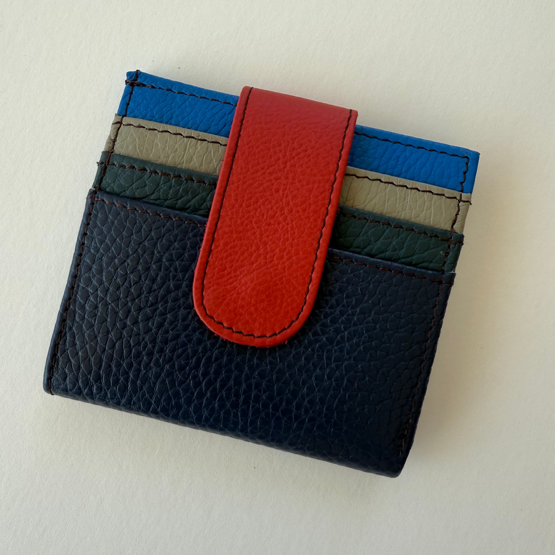navy colored wallet with colorful card slots