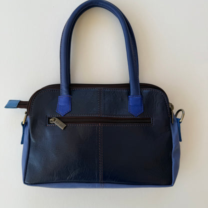 back view of dark blue leather handbag