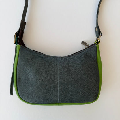back view of leather handbag with deep green color