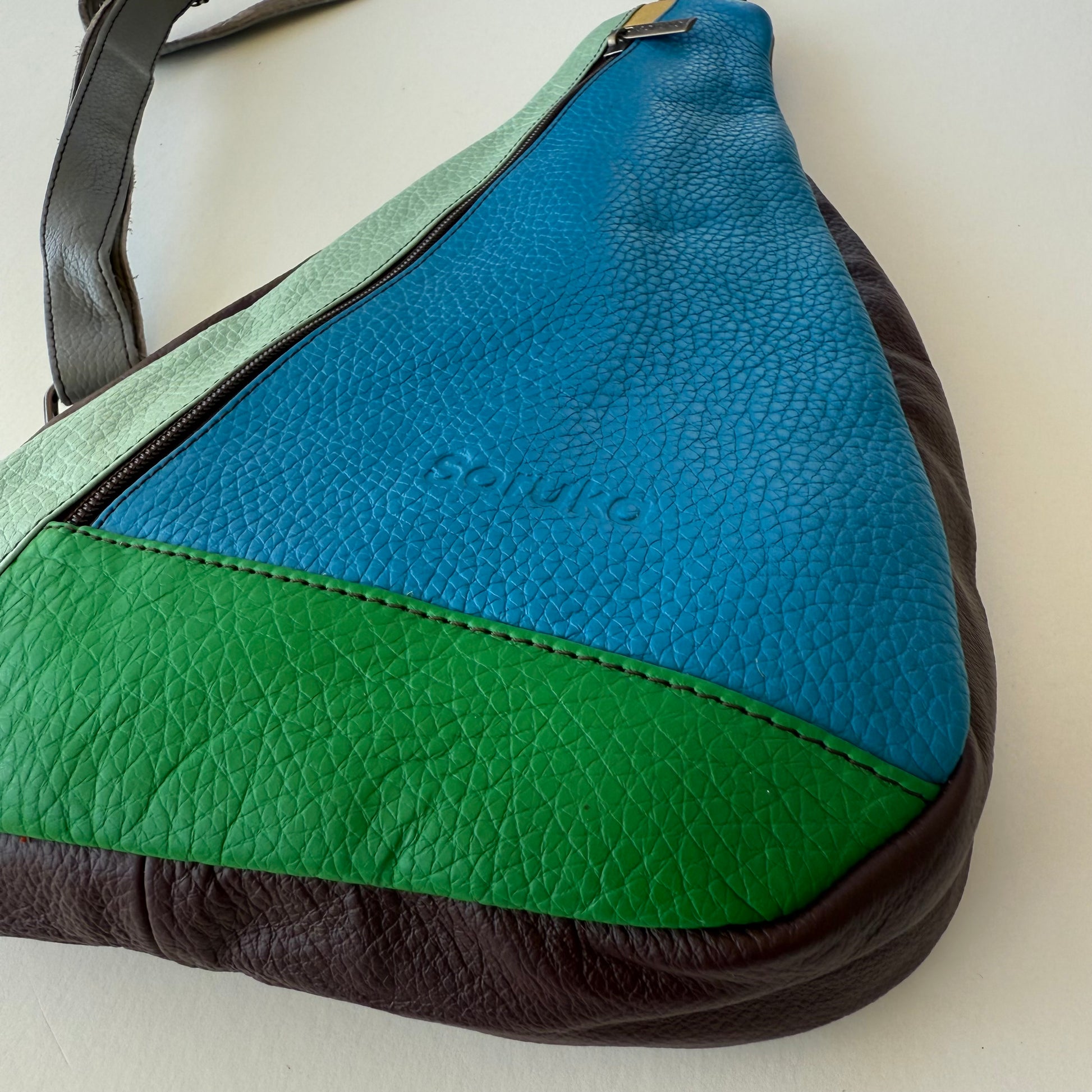 close-up of Multicolored leather bag
