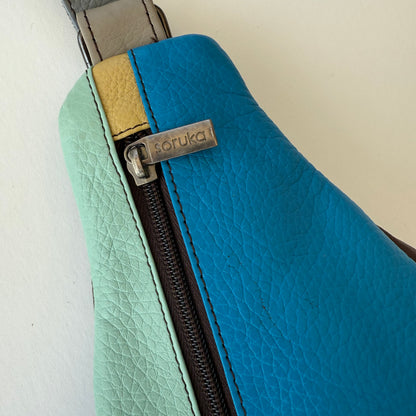close-up of top of Multicolored leather bag