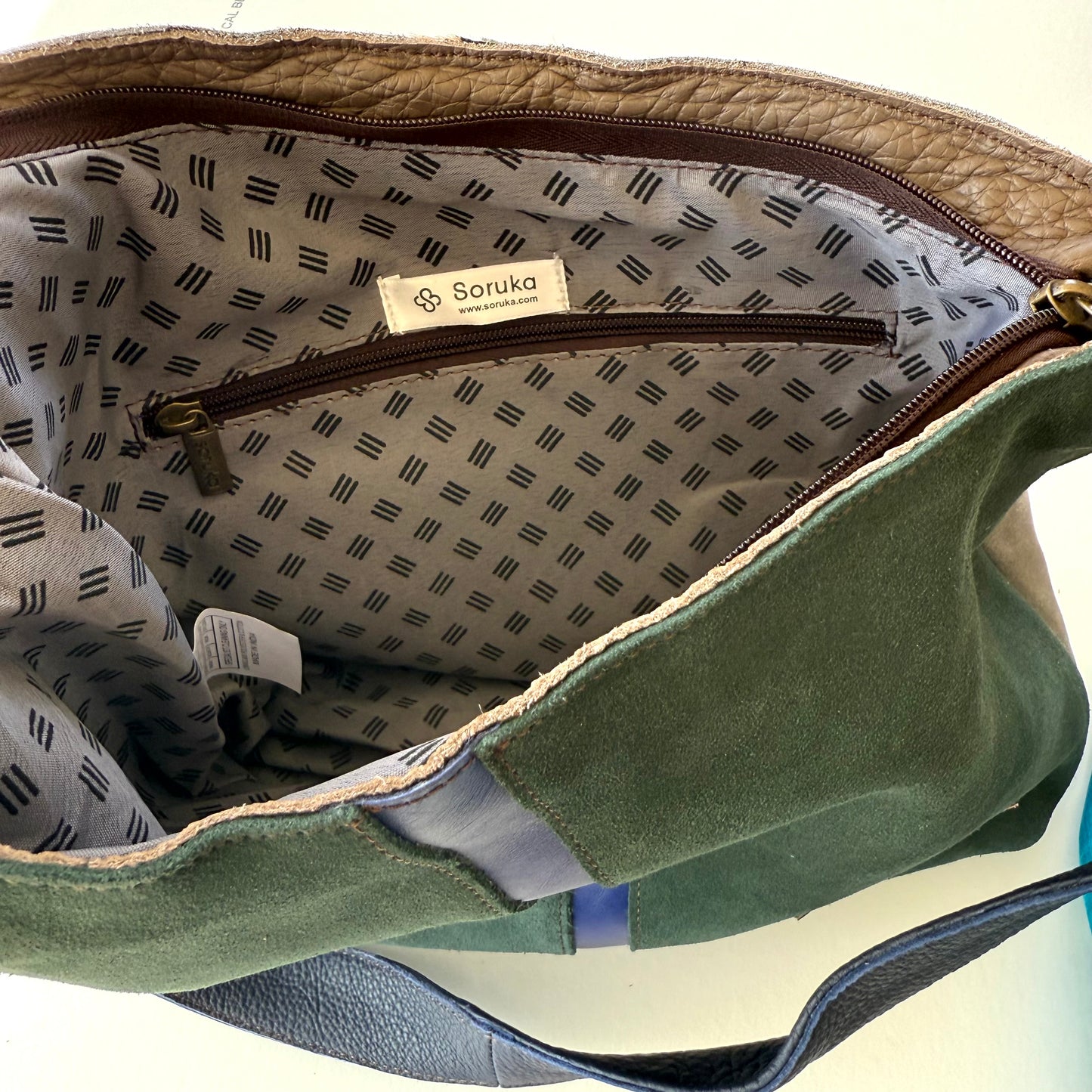 interior view of handbag with patterned lining