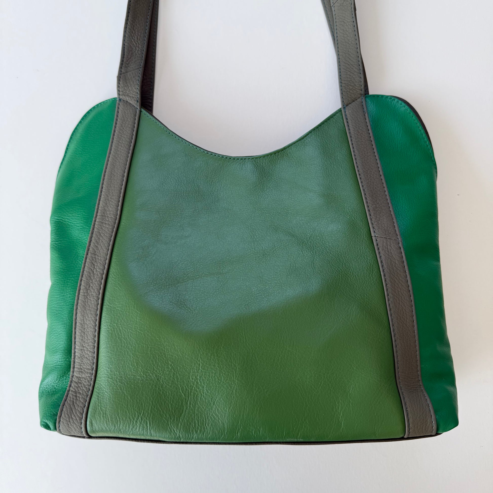 back view of green leather shoulder bag