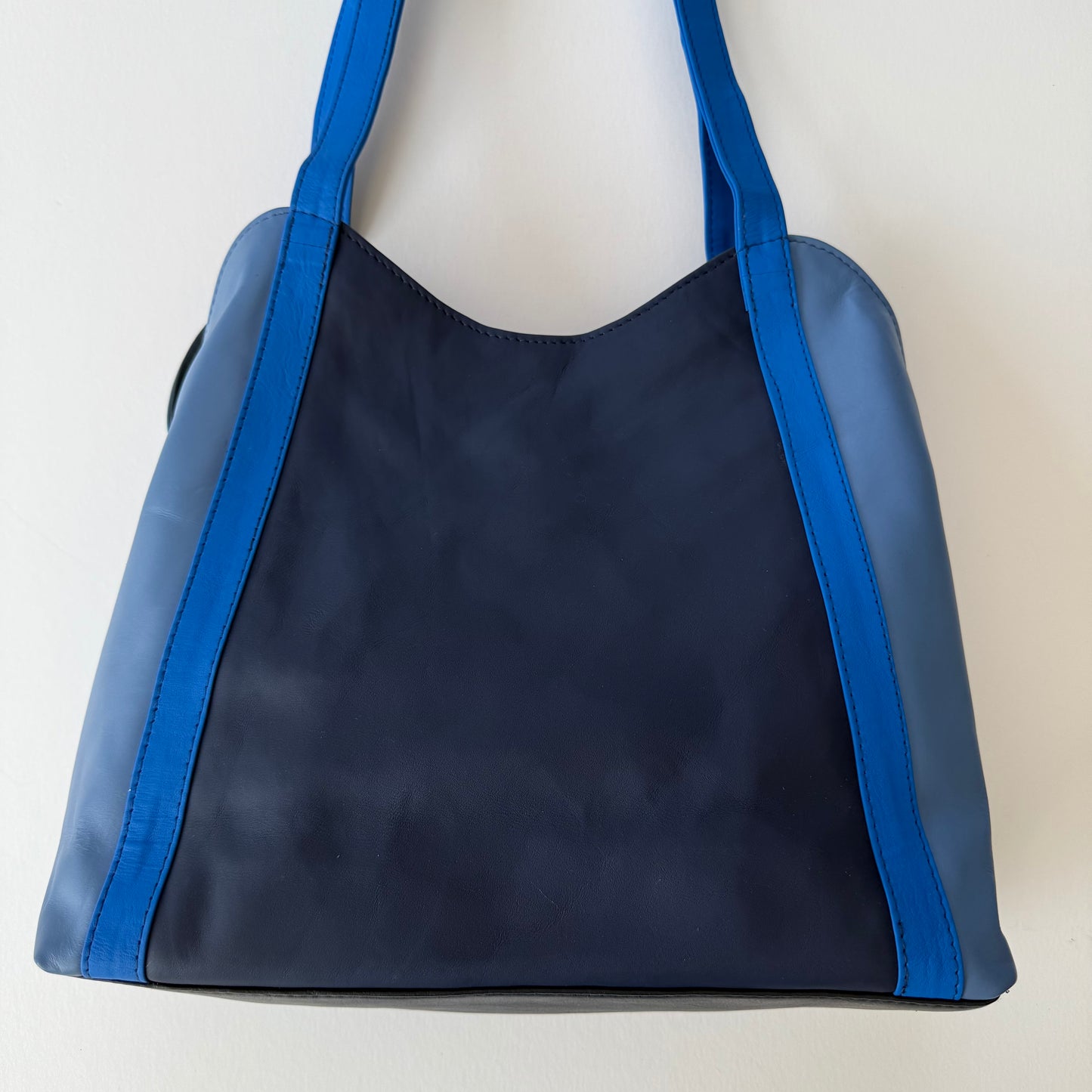 back view of blue leather shoulder bag