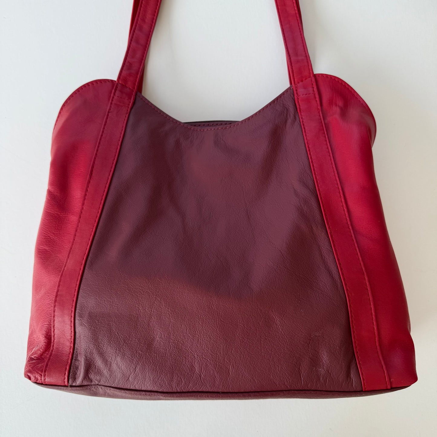 back view of Red handbag on a white background