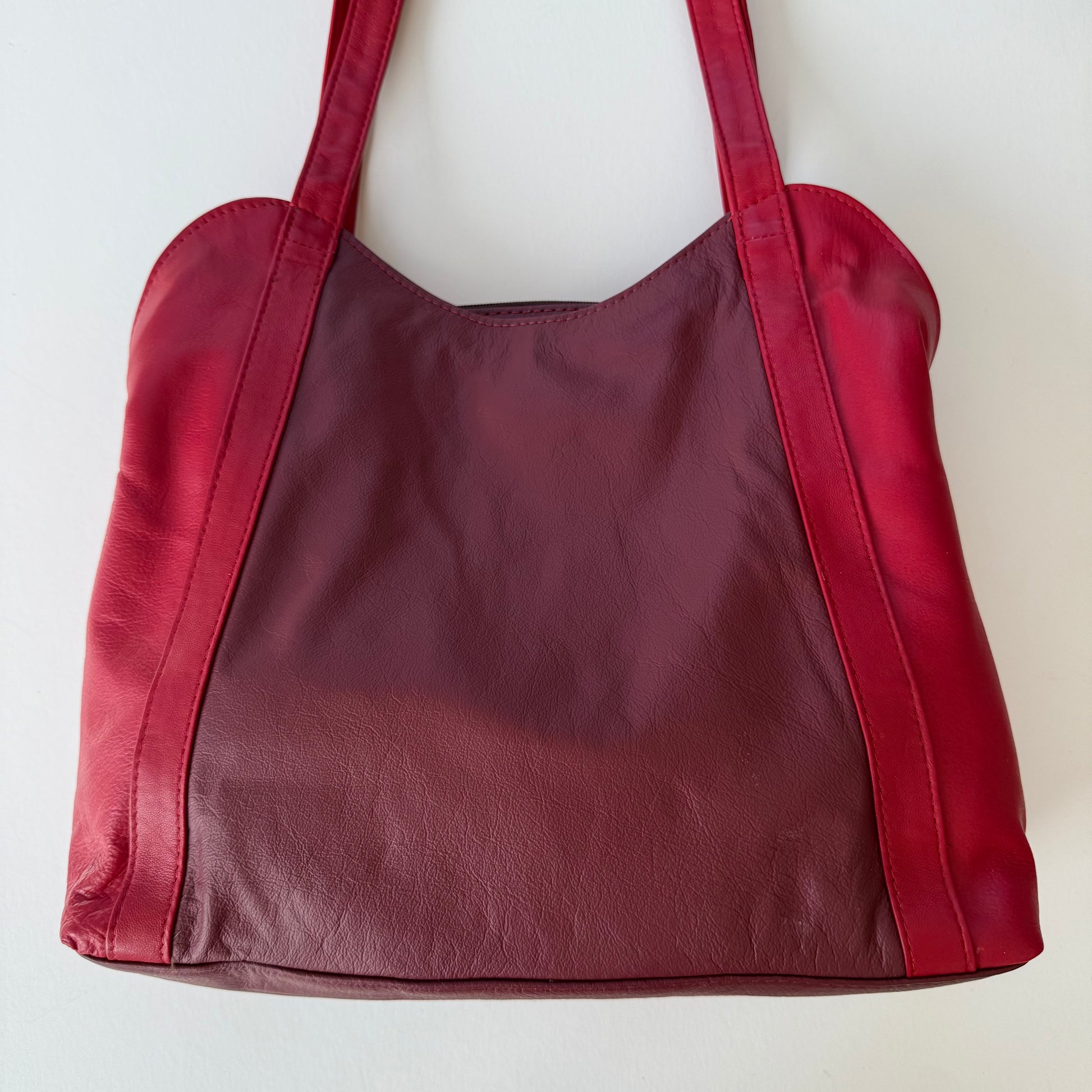 back view of Red handbag on a white background