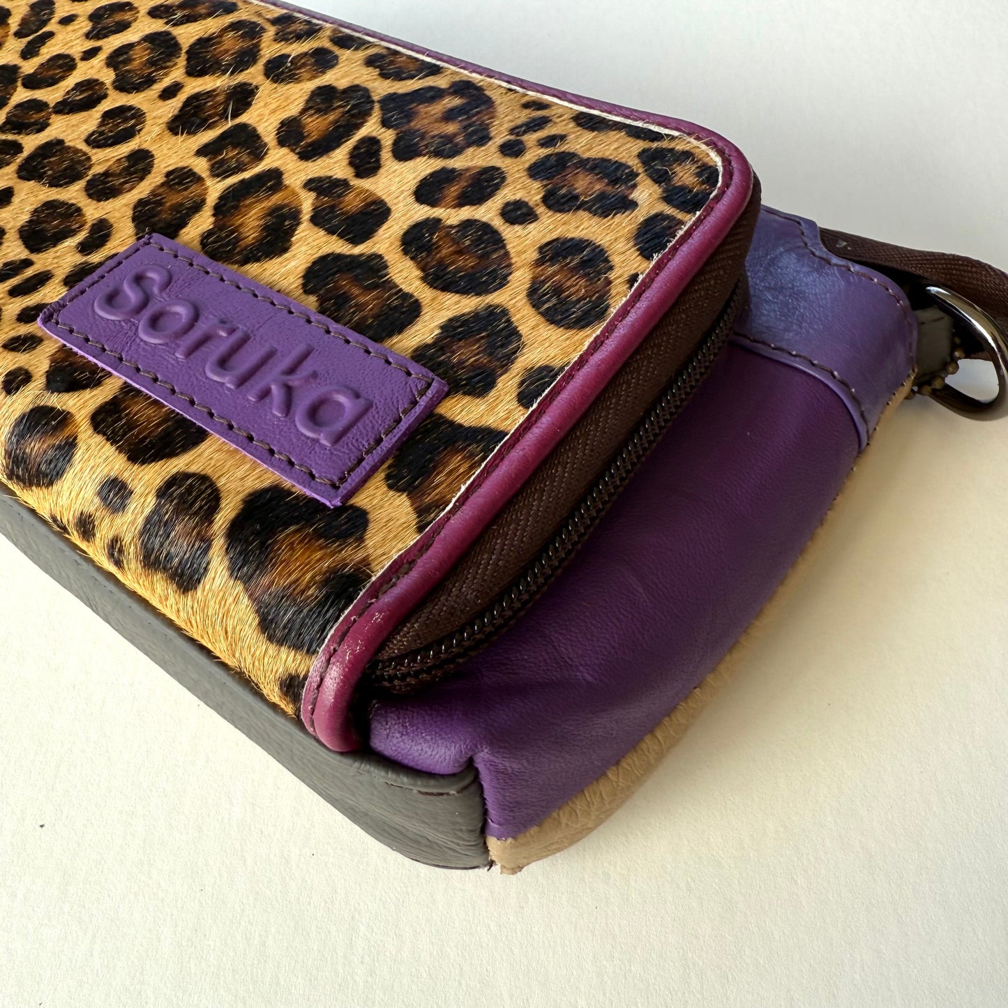 close-up side view of turquoise madison crossbody