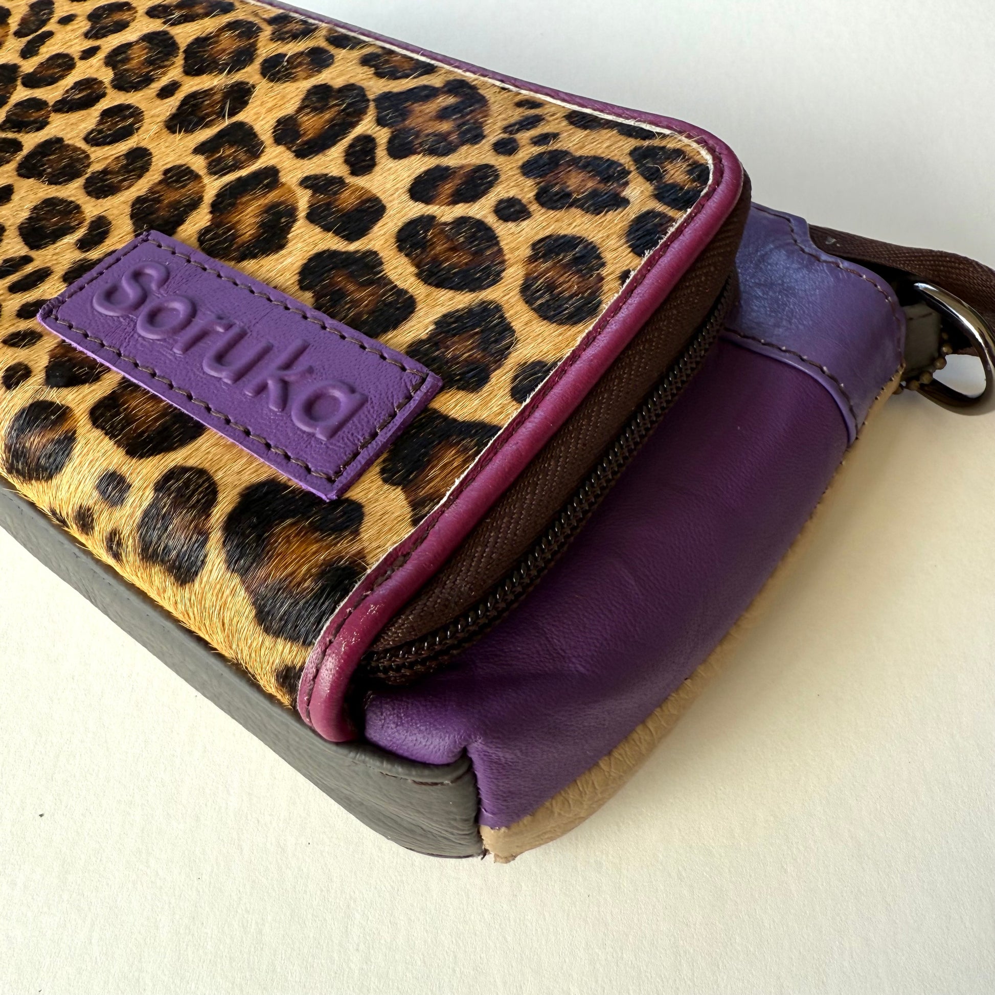close-up side view of turquoise madison crossbody