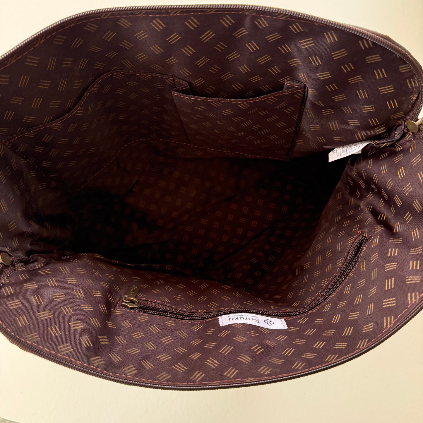interior view of bag with patterned lining