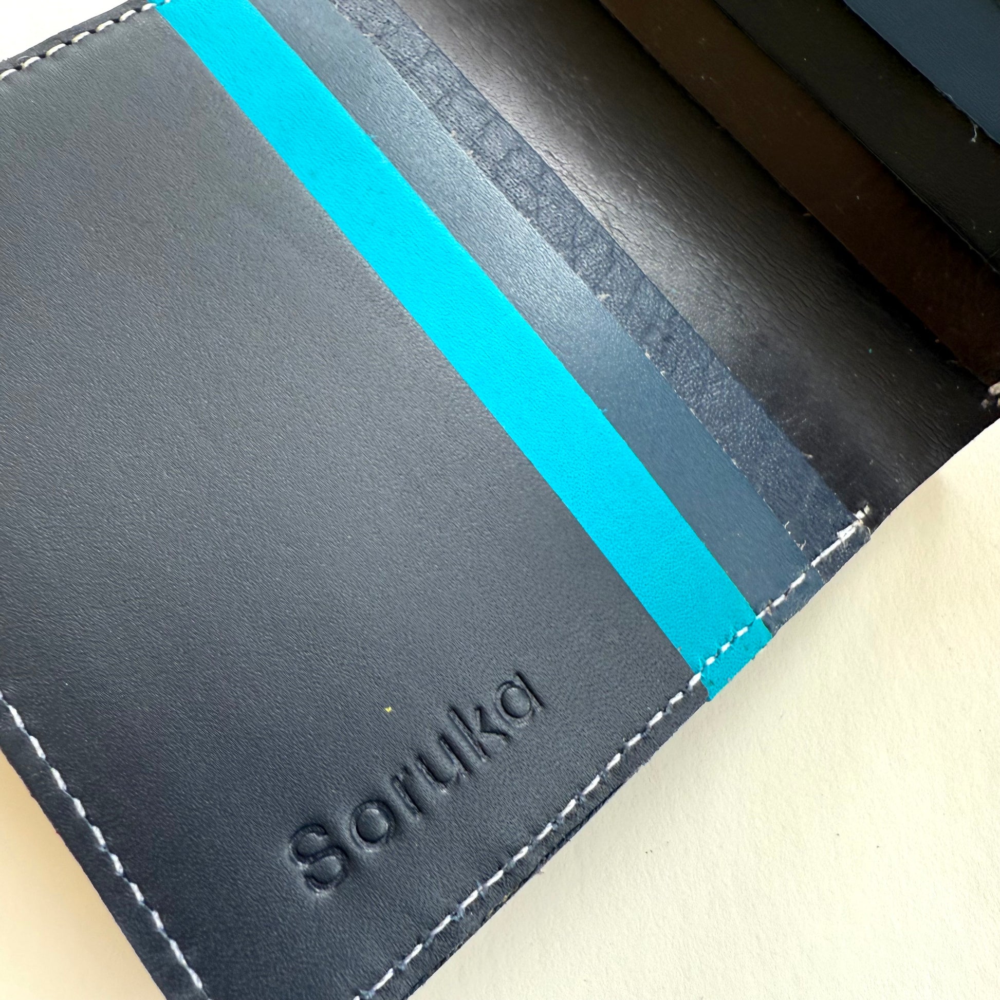 close-up of blue and black card slots