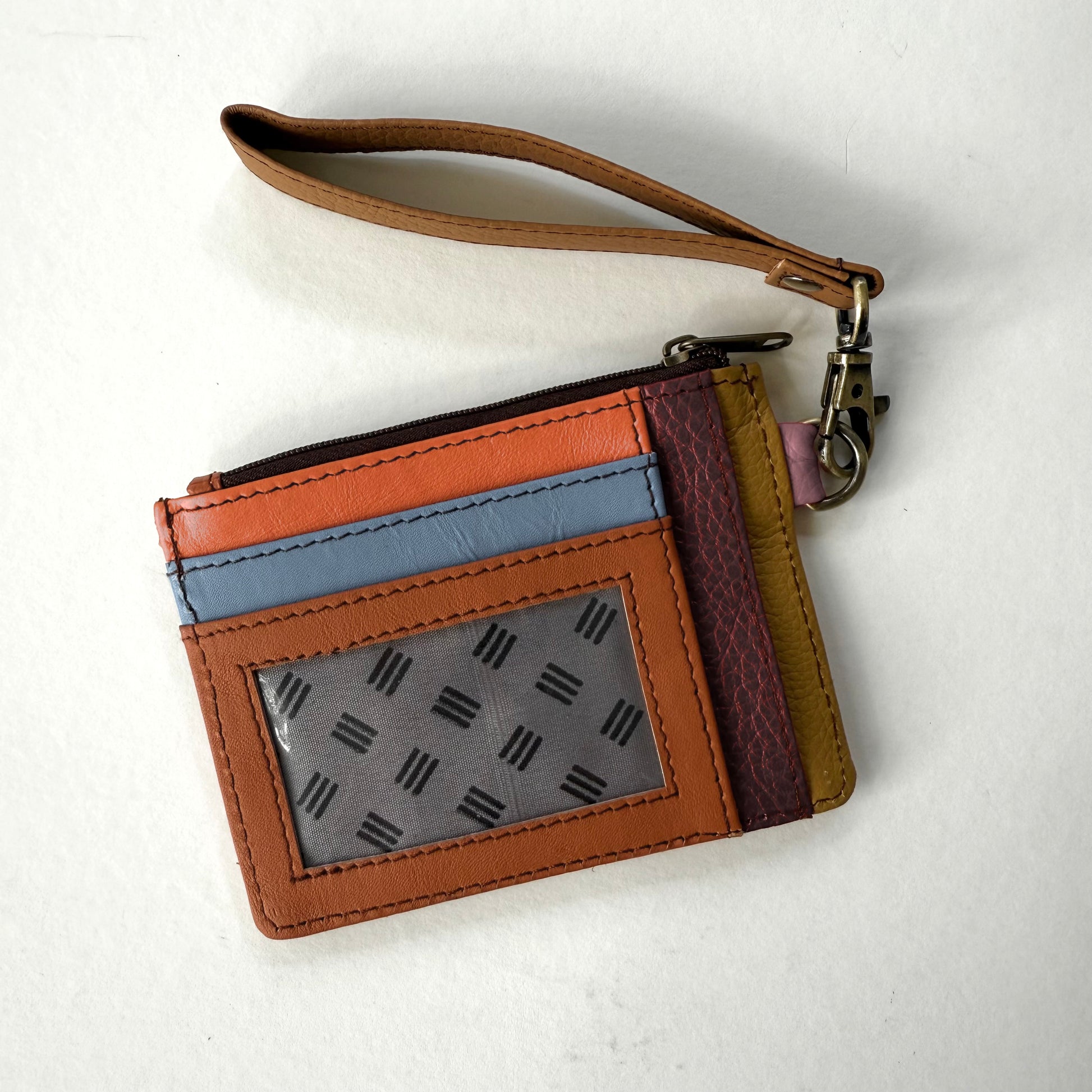 other side of wallet with colorful card slots and clear ID pocket