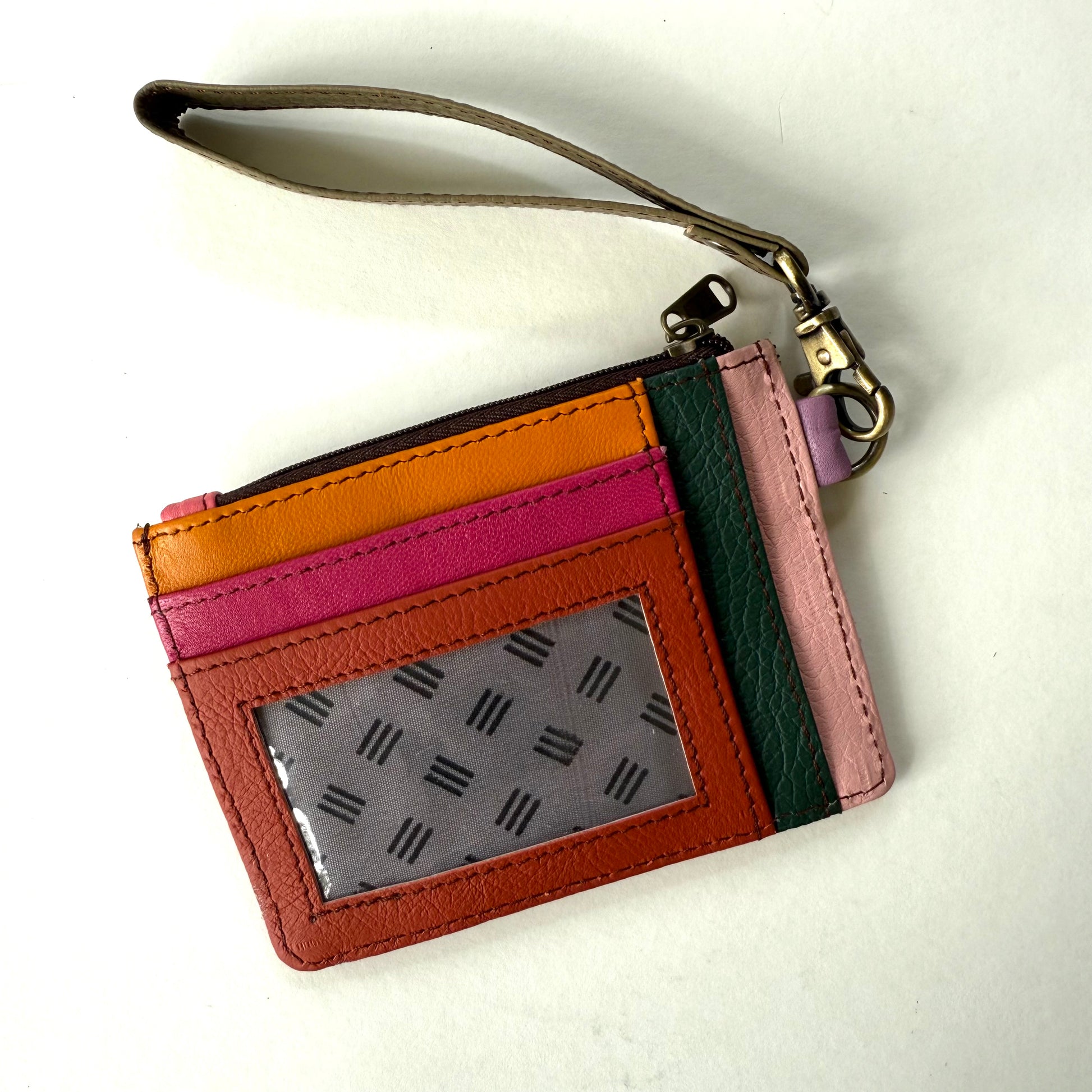 other side of wallet with colorful card slots and clear ID pocket