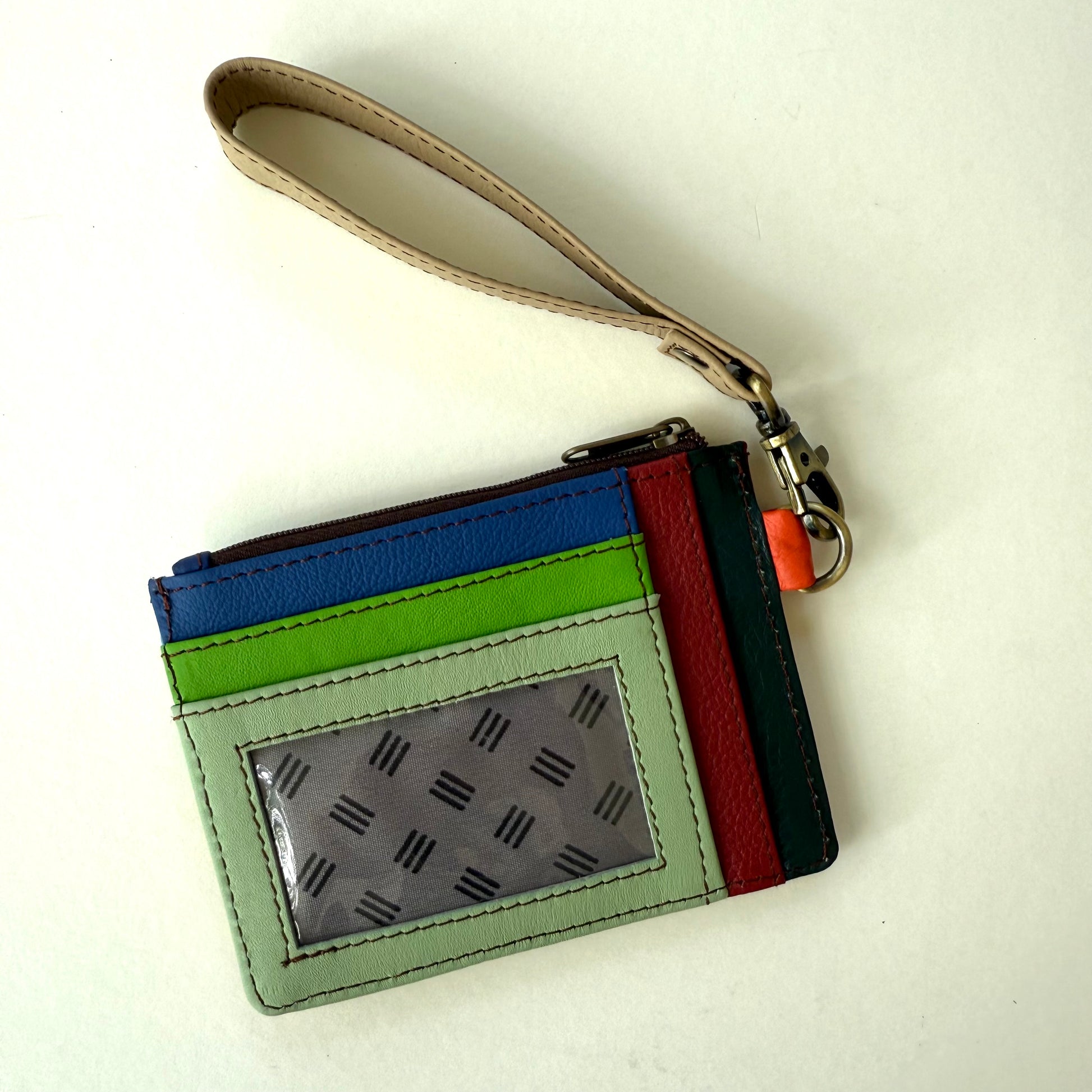 other side of wallet with colorful card slots and clear ID pocket