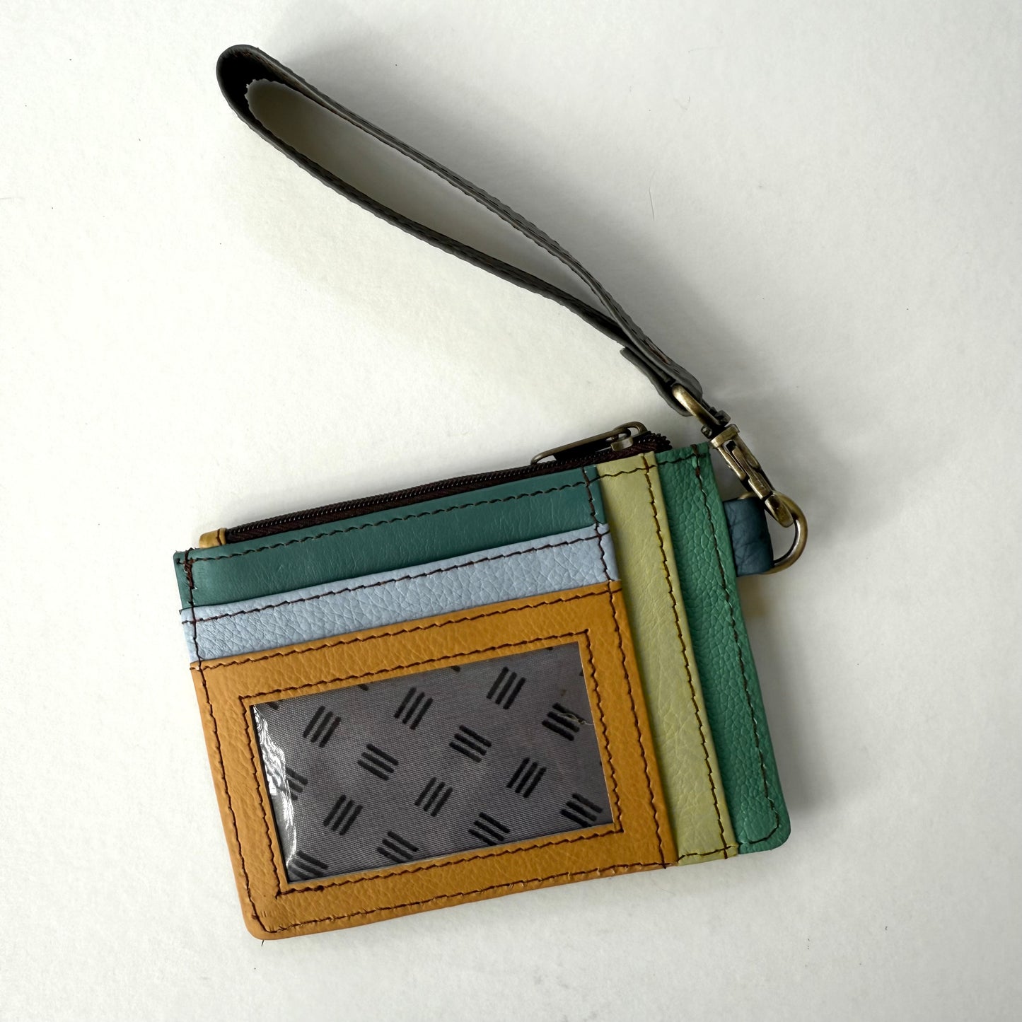 other side of wallet with colorful card slots and clear ID pocket