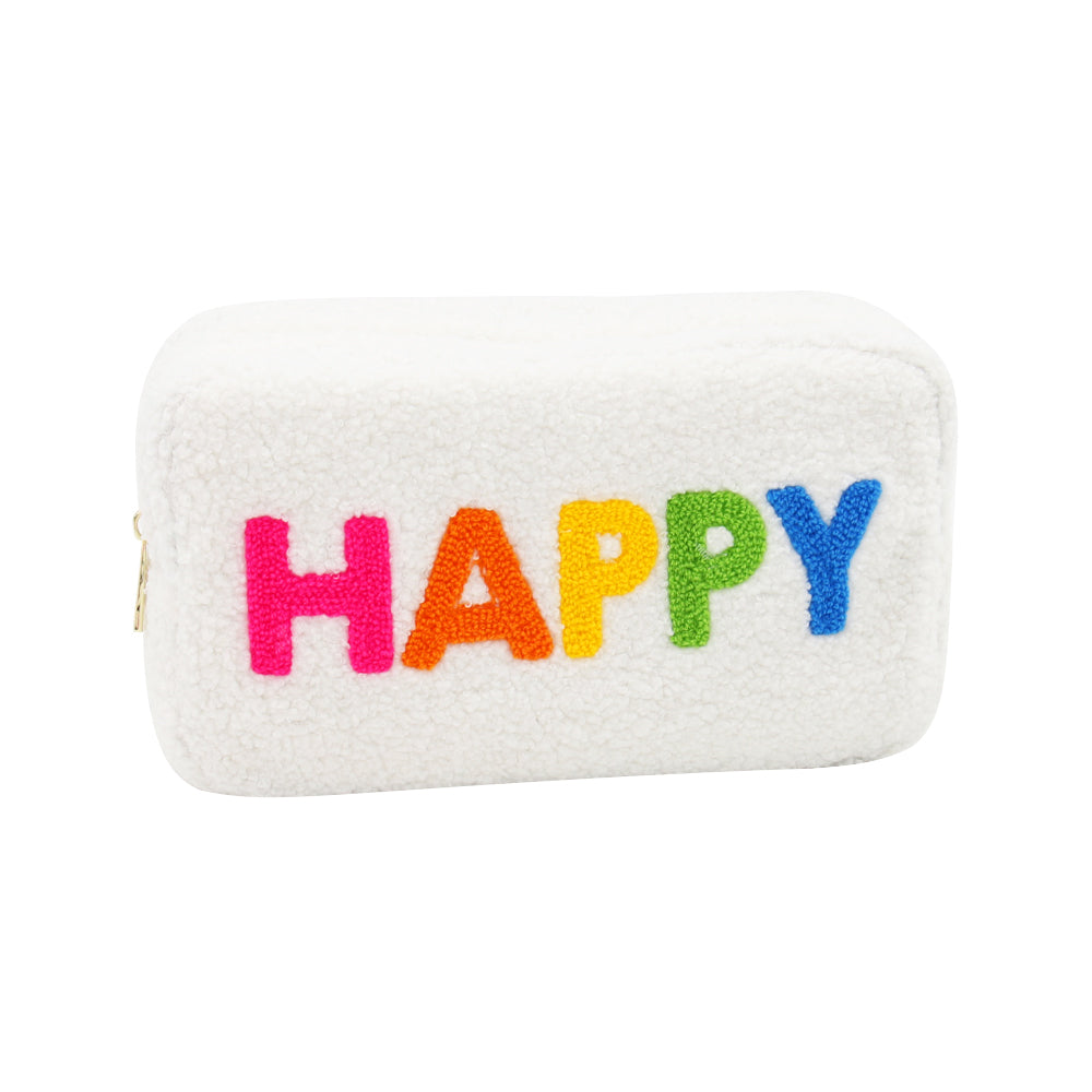 white faux fur bag with "happy" in a rainbow of colors on it.