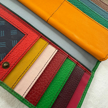 close-up of wallet showing colorful card slots and clear I D pocket