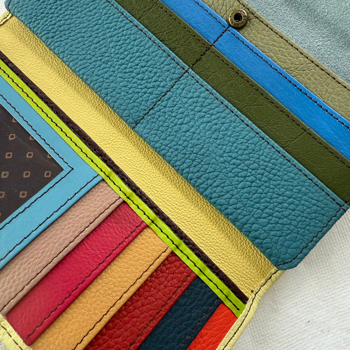 close-up of colorful card slots of interior of wallet