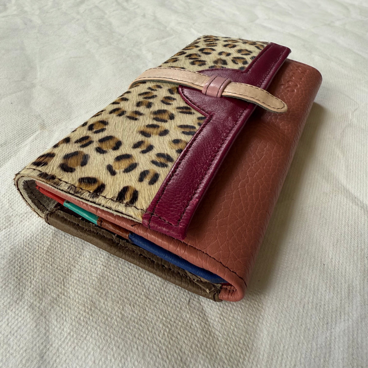 side view of mauve body with leopard print flap