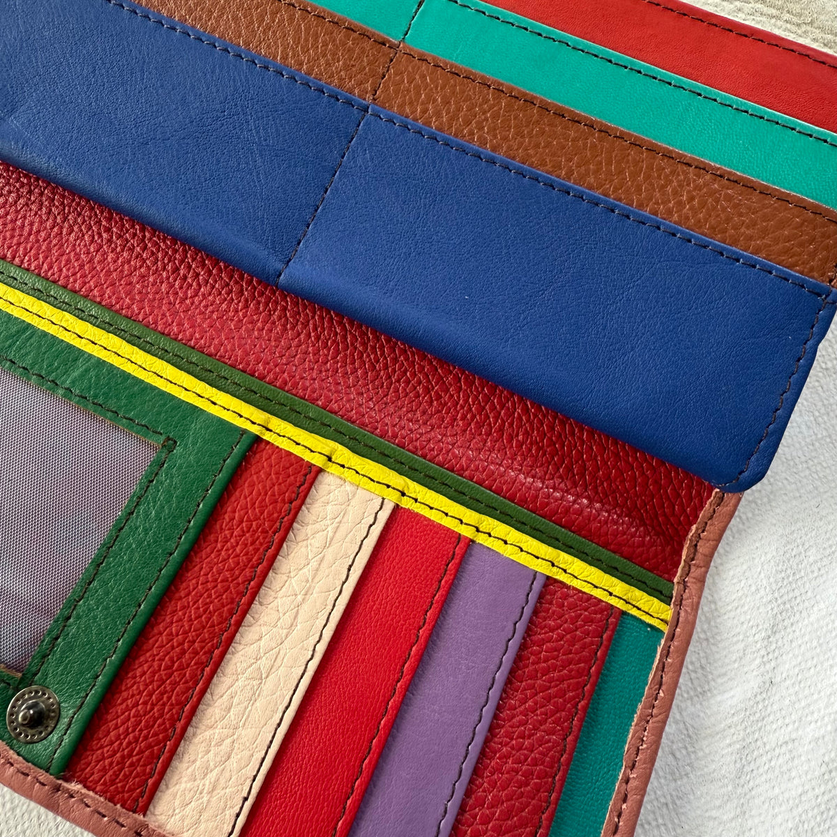 close-up of colorful card slots in wallet