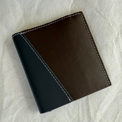 other side of wallet with dark brown and grey leathers