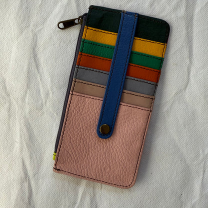 other side of flat wallet with colorful card slots and a zip pocket along the side