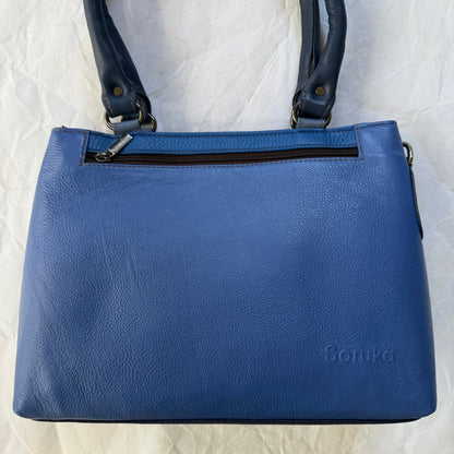blue leather handbag with top zipper pocket and 2 dark blue shoulder straps