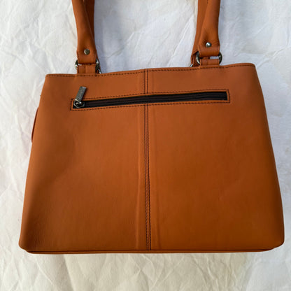warm orange leather handbag with zipper pocket across the top