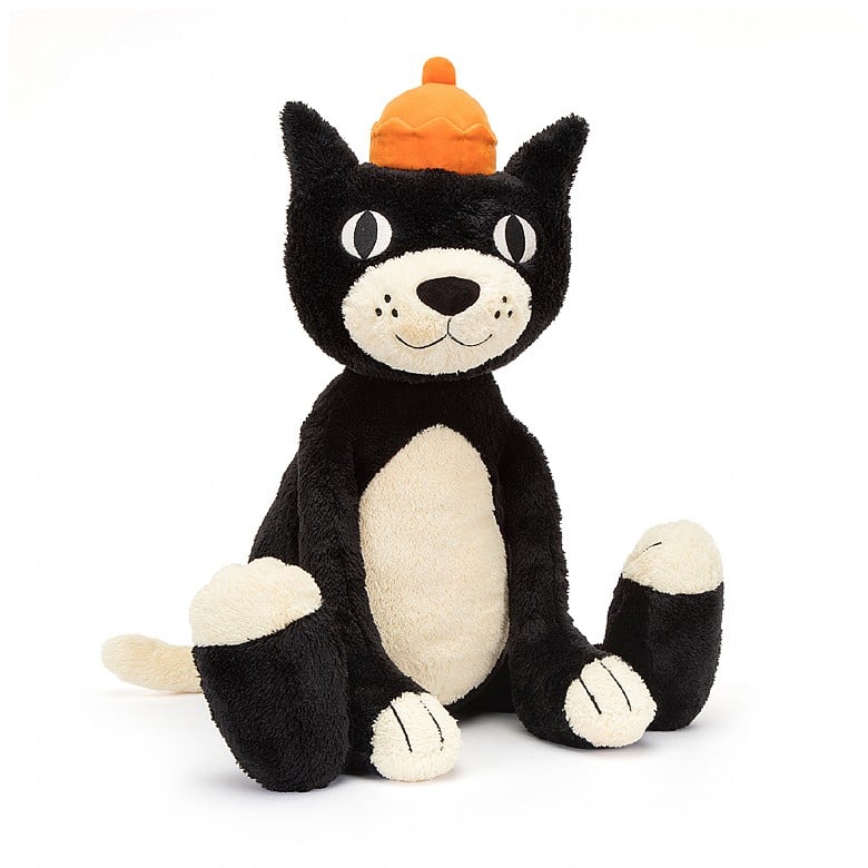 front view of jellycat jack, a black and white stuffed animal wearing an orange crown.